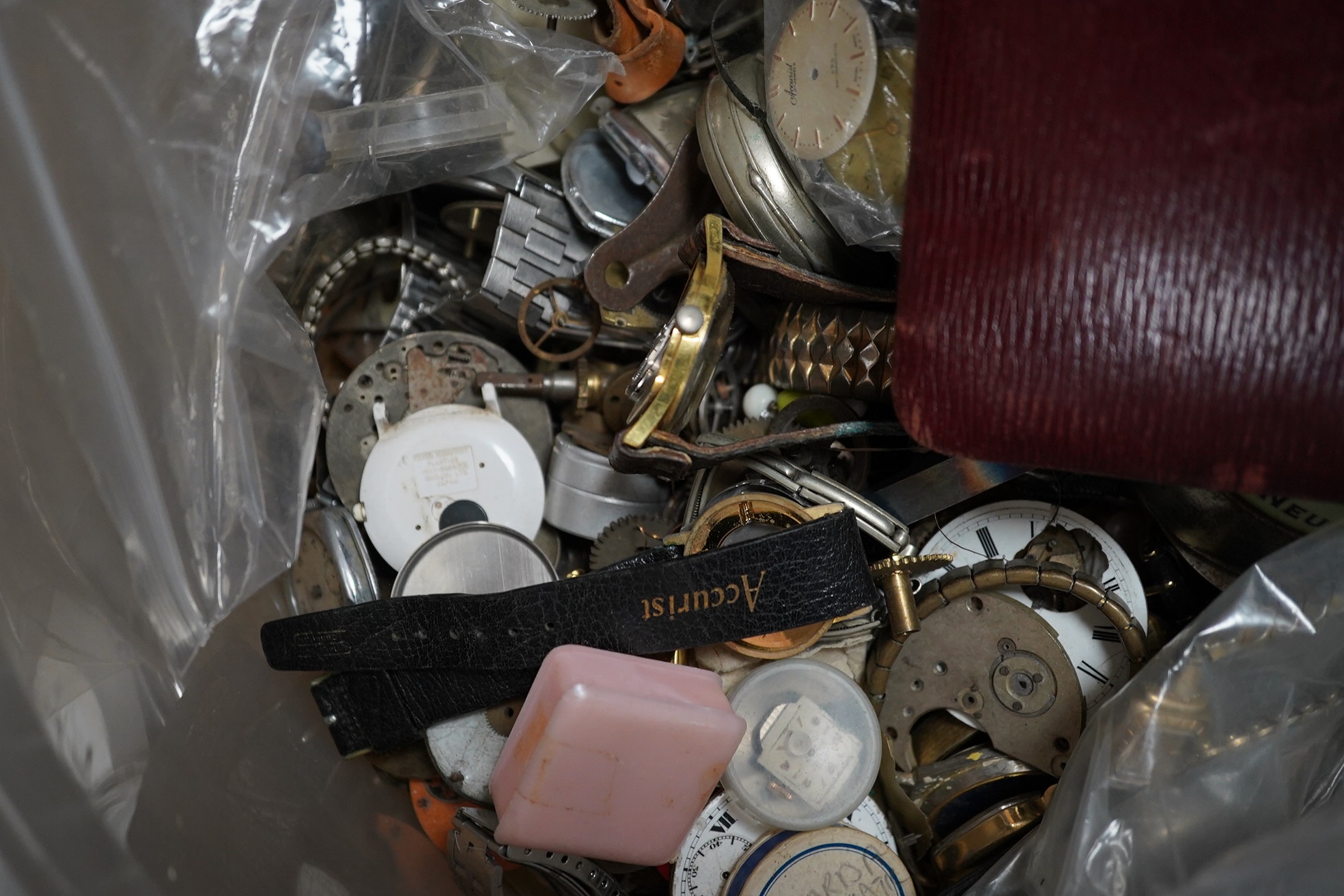 A large quantity of watch parts, spares etc from a watchmaker's studio. Condition - poor to fair